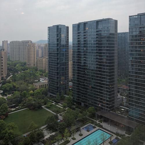 玻璃幕墙的楼盘好不好配图