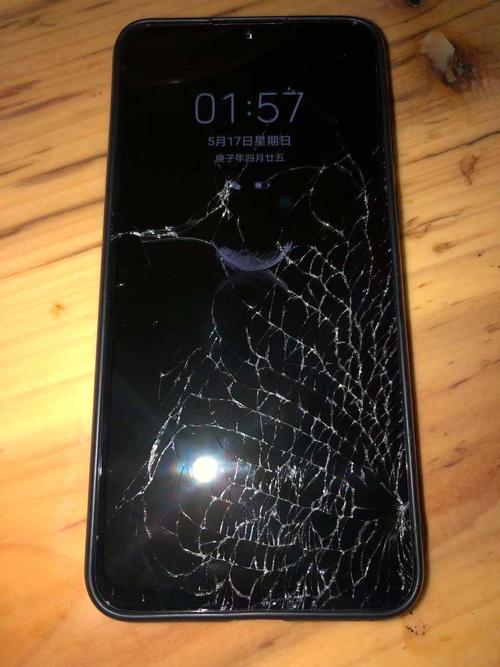 手机屏幕玻璃下面黑色的是什么配图