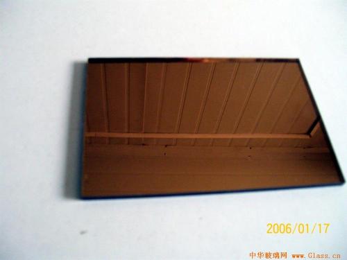 用薄的茶色玻璃代替平面镜,目的是配图